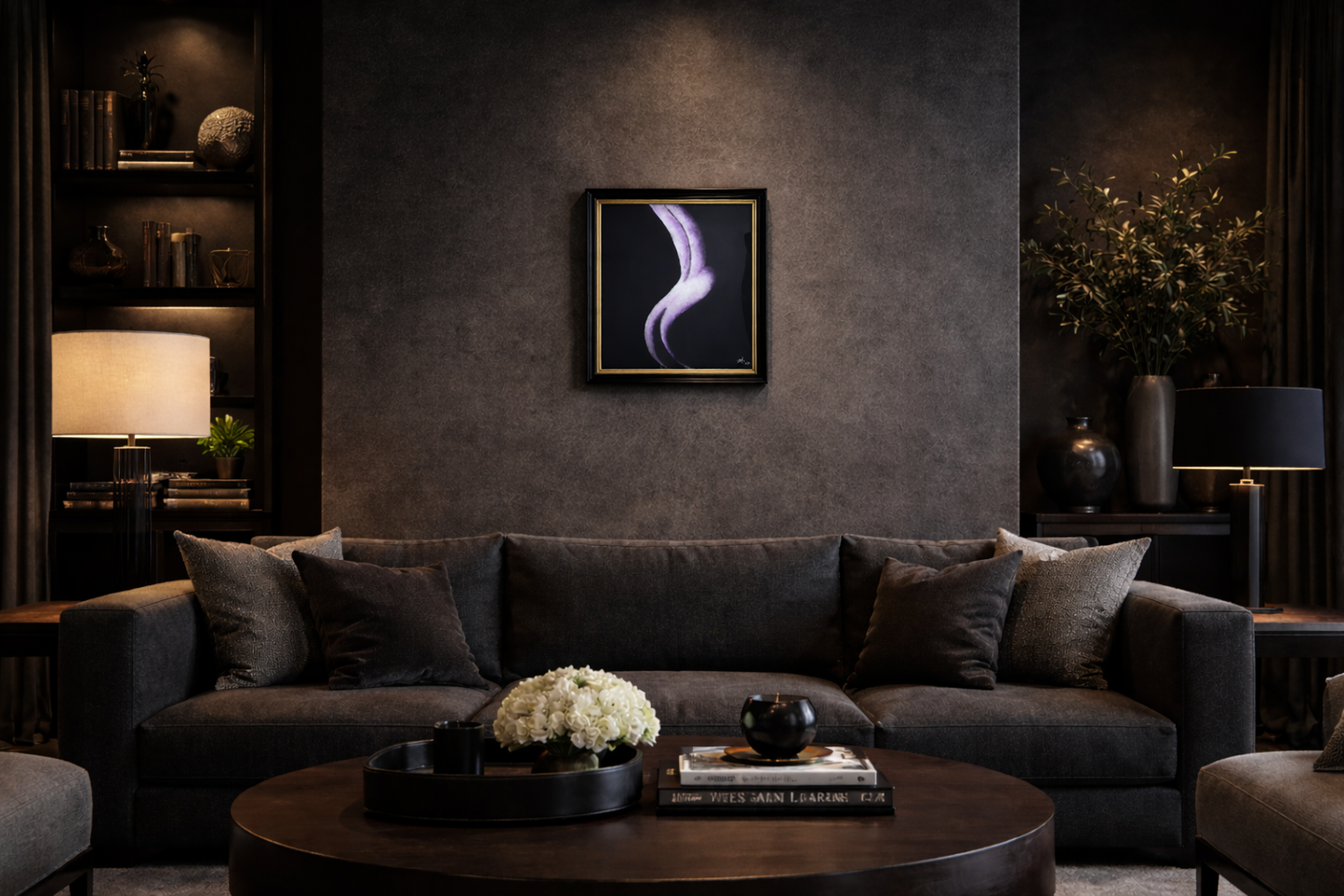 Framed abstract purple figure artwork, The Evolution of Her — Founder’s Edition, on a dark wall above a gray sofa.